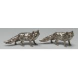 A pair of Elizabeth II cast silver novelty condiments, each cast as a fox, 11cm long, London 1971,