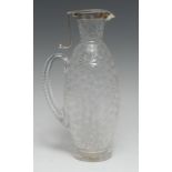 A Victorian Aesthetic Movement silver mounted clear glass slender ovoid claret jug,
