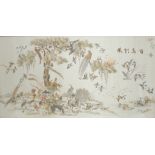 A late 19th/early 20th century Chinese embroidery on silk, various birds in flight and wading,