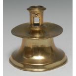 A 16th century Spanish brass capstan candlestick, pierced cylindrical sconce,