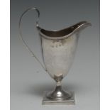 Hester Bateman - a George III silver helmet shaped cream jug, beaded border,