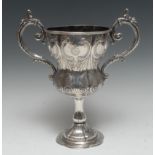 A 19th century Anglo-Indian silver inverted ogee pedestal military presentation cup,