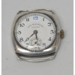 A vintage 1930s silver cased wristwatch head, white enamelled dial, Arabic Numerals,
