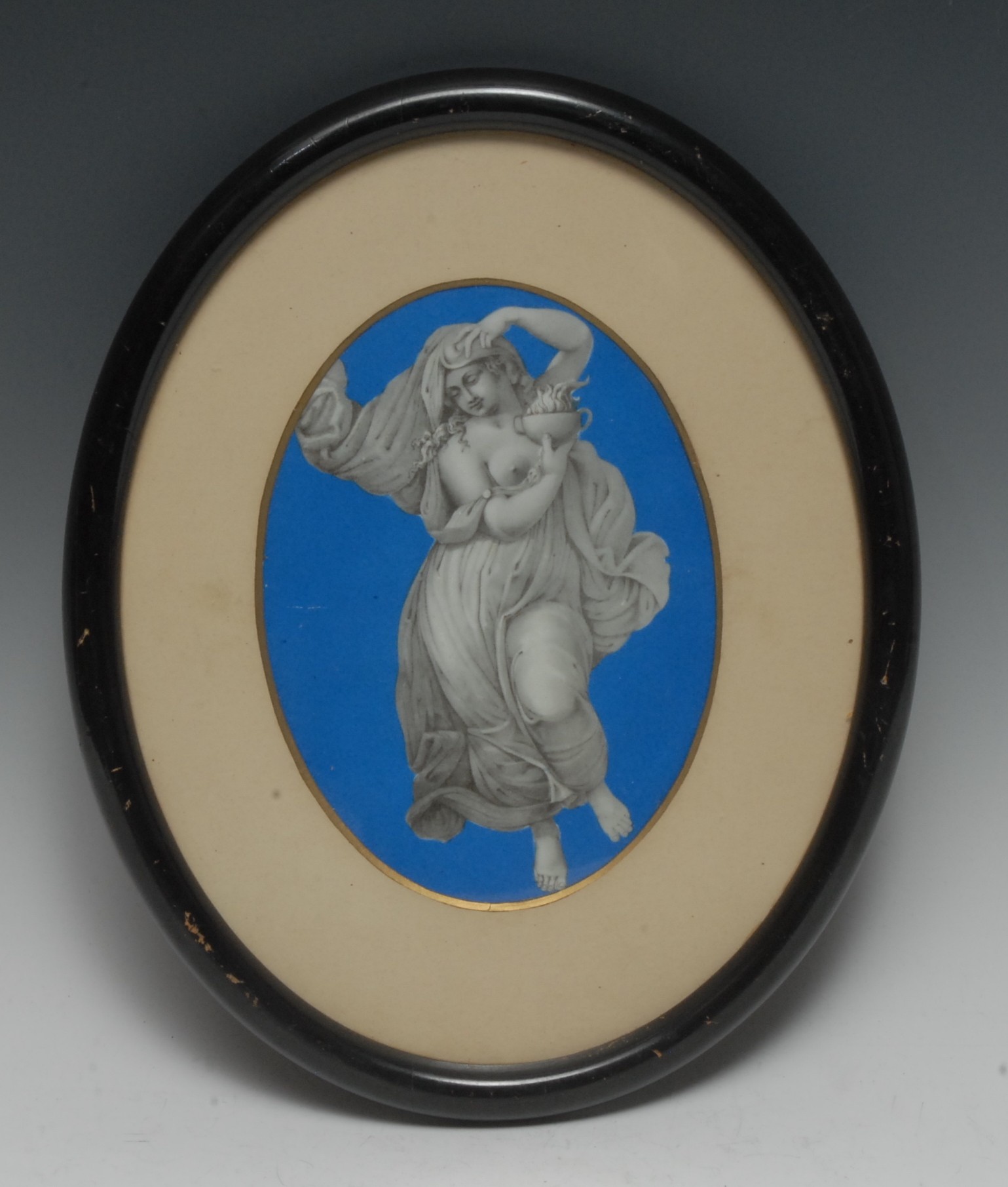 An early 19th century English Neoclassical porcelain oval plaque,