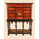 A 17th century Flemish tortoiseshell, ebony and marquetry cabinet on stand,