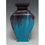 A Chinese turquoise and aubergine glazed rectangular vase, moulded with a phoenix roundel,