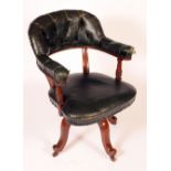 A Victorian mahogany club-type swivel desk chair, deep buttoned leather upholstery,