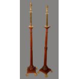 Ecclesiastical Salvage - a pair of oak floor standing lamps, each as a fluted architectural column,
