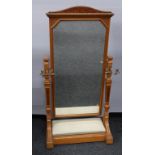 Gillows of Lancaster - a Victorian ash and walnut cheval mirror,