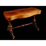 A Victorian burr walnut serpentine library table, moulded top with matched veneers,