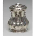 An Austrian Art Nouveau silver baluster money box, embossed with lilies and sinuous lines,