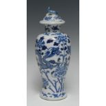 A Chinese porcelain baluster vase and cover,