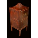 A George III mahogany plate cabinet, pagoda top centred by an inlaid roundel,