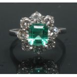 A Columbian emerald and diamond cluster ring,