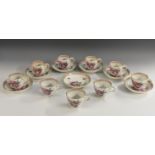 Five Meissen coffee cups, four ogee shaped cups and seven saucers, each decorated with peonies,