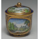 An 18th century Sèvres sucrier and cover, decorated with landscape within an oval cartouche,