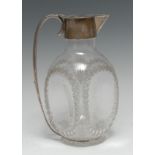 A Victorian silver mounted square cut-clear glass claret jug, hinged cover, scroll handle,