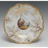 A Flight Barr & Barr shaped circular plate, painted to centre by Davis with an exotic bird,