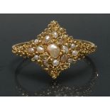 A blister pearl and 15ct gold hinge bangle, naturalistic scrolling crest,