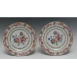 A pair of 18th century Chinese Export famille rose circular plates,