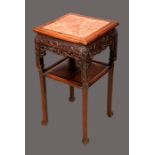 A Chinese padouk wood square jardiniere stand, moulded top with inset soapstone panel,