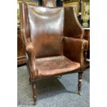 A 19th century mahogany porter's chair,