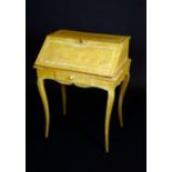 A 18th century French Provincial bureau du dame, painted in 'shabby chic' taste,