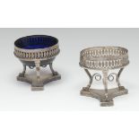 A pair of Continental Neo-Classical gueridon salts, pierced friezes, cabriole legs, lion paw feet,