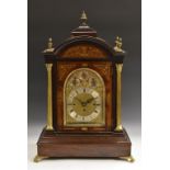 A substantial Victorian rosewood and brass marquetry musical bracket clock,