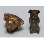 A Victorian novelty brass vesta, as a pug's head, 4.5cm long, c.