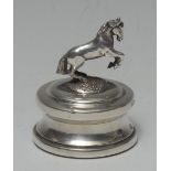An Elizabeth II silver novelty desk paperweight, crested by a rearing horse, 5cm high,