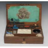 A George III mahogany rectangular artist's box, hinged cover enclosing colours and paints,