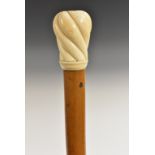 An early 18th century gentleman's ivory and malacca walking stick,