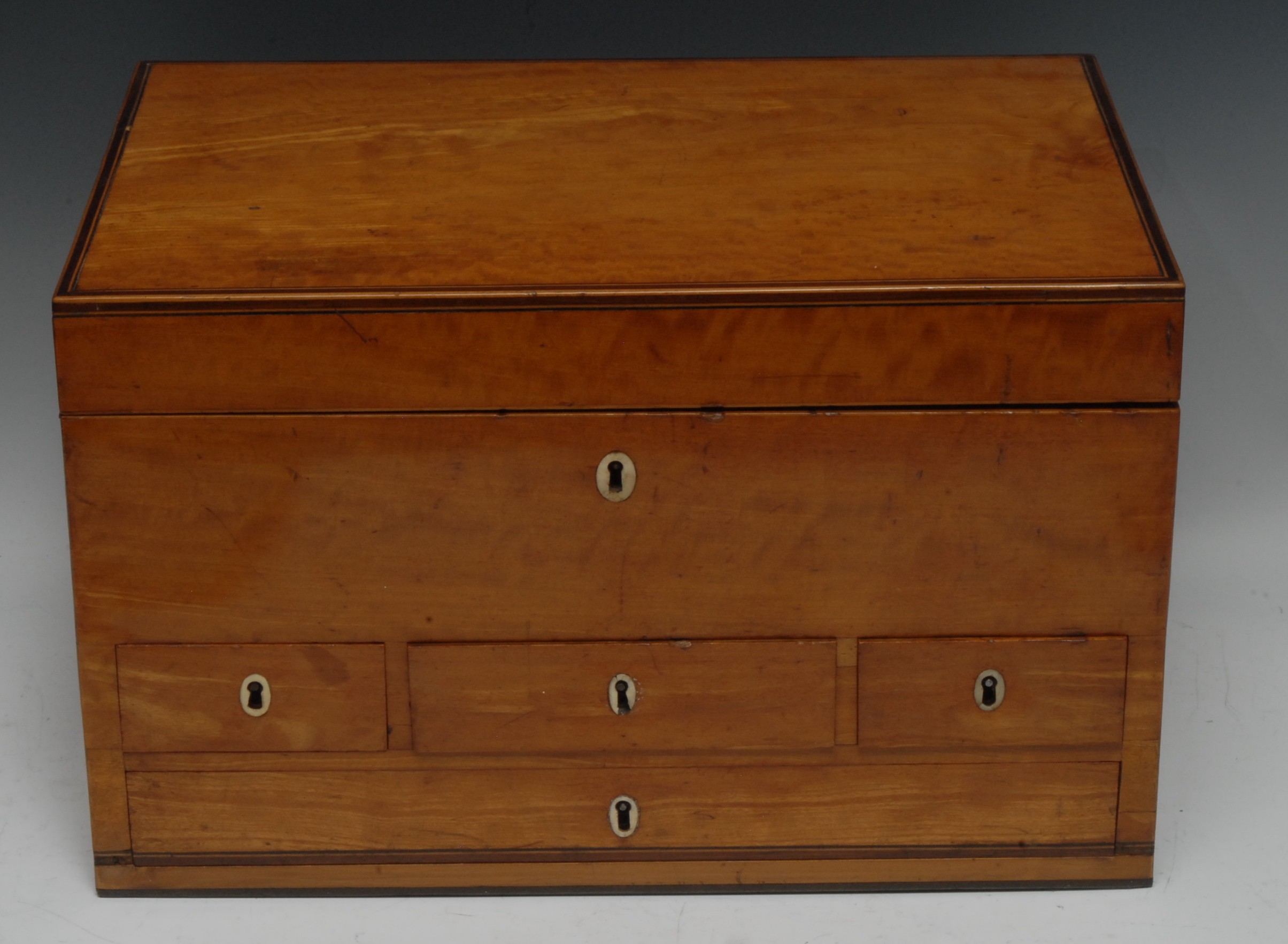 A substantial George III satinwood and rosewood crossbanded rectangular lady's dressing box,