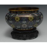 A Chinese cloisonné lobed ovoid jardiniere, profusely decorated in polychrome with lotus,