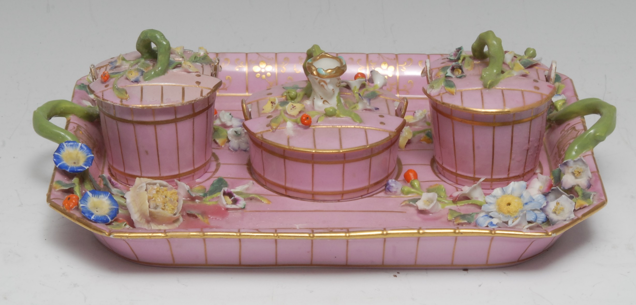 A Minton canted rectangular standish, with two 'coopered' pail inkwells and central taper stick,