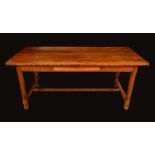 A French Provincial fruitwood refectory table,