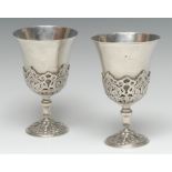 A pair of 19th century Turkish silver wine goblets, the flared bowls engine turned,