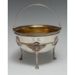 Tiffany & Co - an American silver swing-handled hemi-spherical table dish,