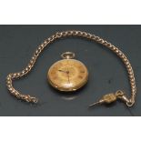 A Victorian 18ct gold open face pocket watch, ornate gilt floral dial, painted Roman numerals,