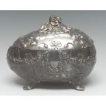 A WMF style ovoid casket, hinged cover crested by embracing putti, in relief overall with flowers,