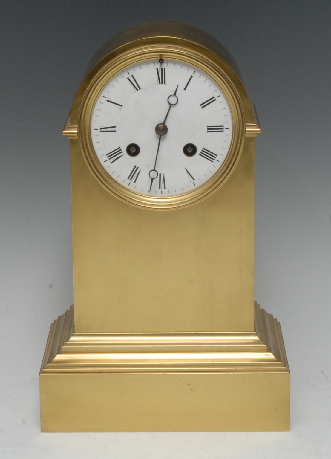 A late 19th century French arched top brass mantel clock, 9.