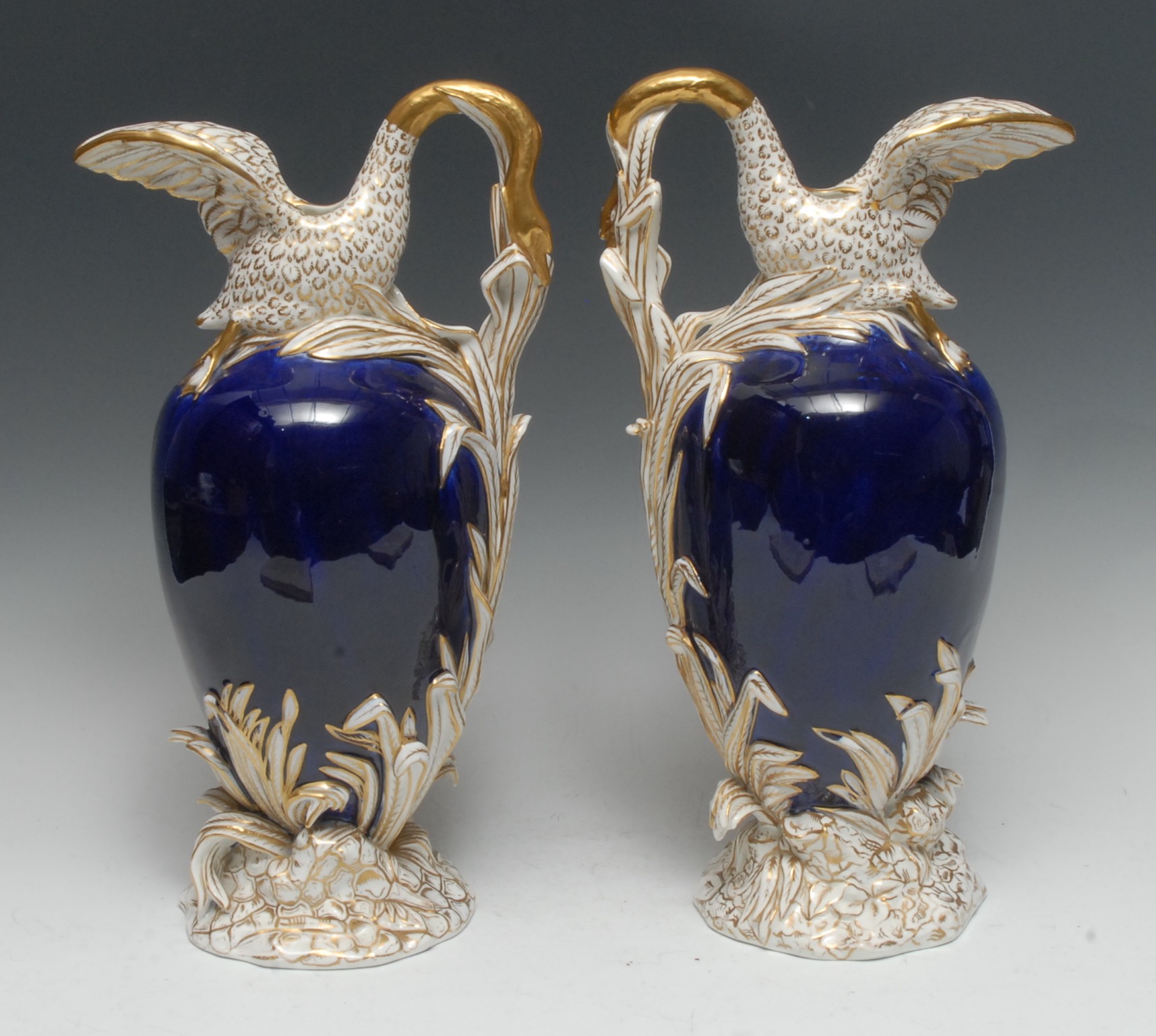 A pair of early 19th century English porcelain ewers, possibly H. & R.