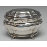 A Victorian silver bombe shaped tea caddy, hinged cover, scroll feet, 13cm wide,