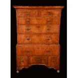 A George I walnut chest on stand, stepped cornice above two short and three long graduated drawers,