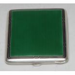 An Art Deco silver and enamel rounded rectangular cigarette case, 9.5cm wide, 900 standard, c.