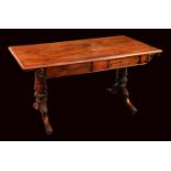 A William IV rosewood rounded rectangular library table, moulded top above a pair of frieze drawers,