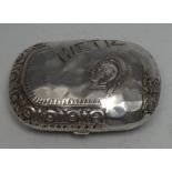 A Victorian Grecian Revival silver rounded rectangular purse, embossed with a Classical soldier,
