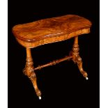 A Victorian walnut shaped rectangular card table,