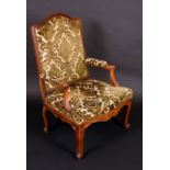 A French Louis XIV design walnut caquetoire armchair, arched cresting, stuffed over upholstery,